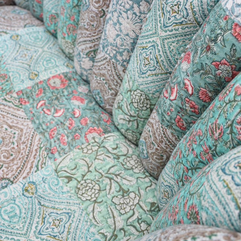 Ailani Handcrafted Petite Sofa 6 close up of ailani petite patchwork teal sofa fabric texture and stitching detail