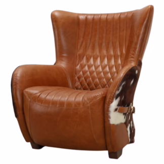 angled view of cowhide leather accent chair showing wingback silhouette and seat depth