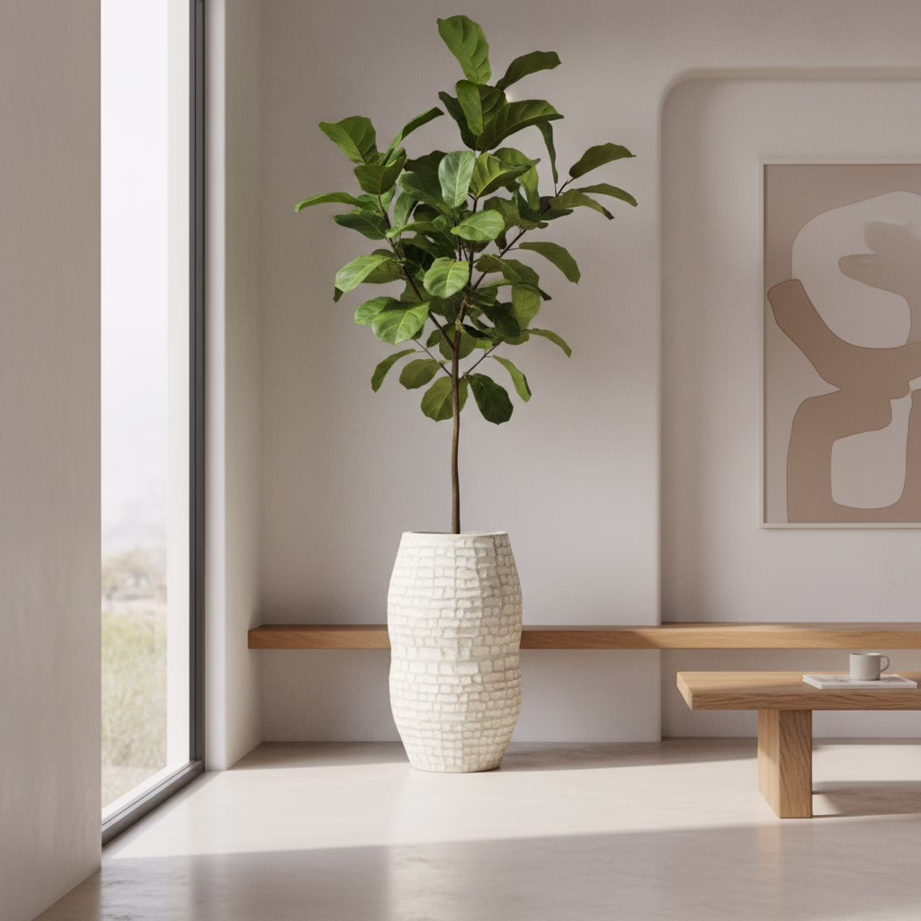 Handmade Terracotta 30" Floor Vase, MXG 482 7 Aged ivory textured terracotta vase with a tall leafy decorative arrangement beside a window, wooden bench and neutral abstract artwork.